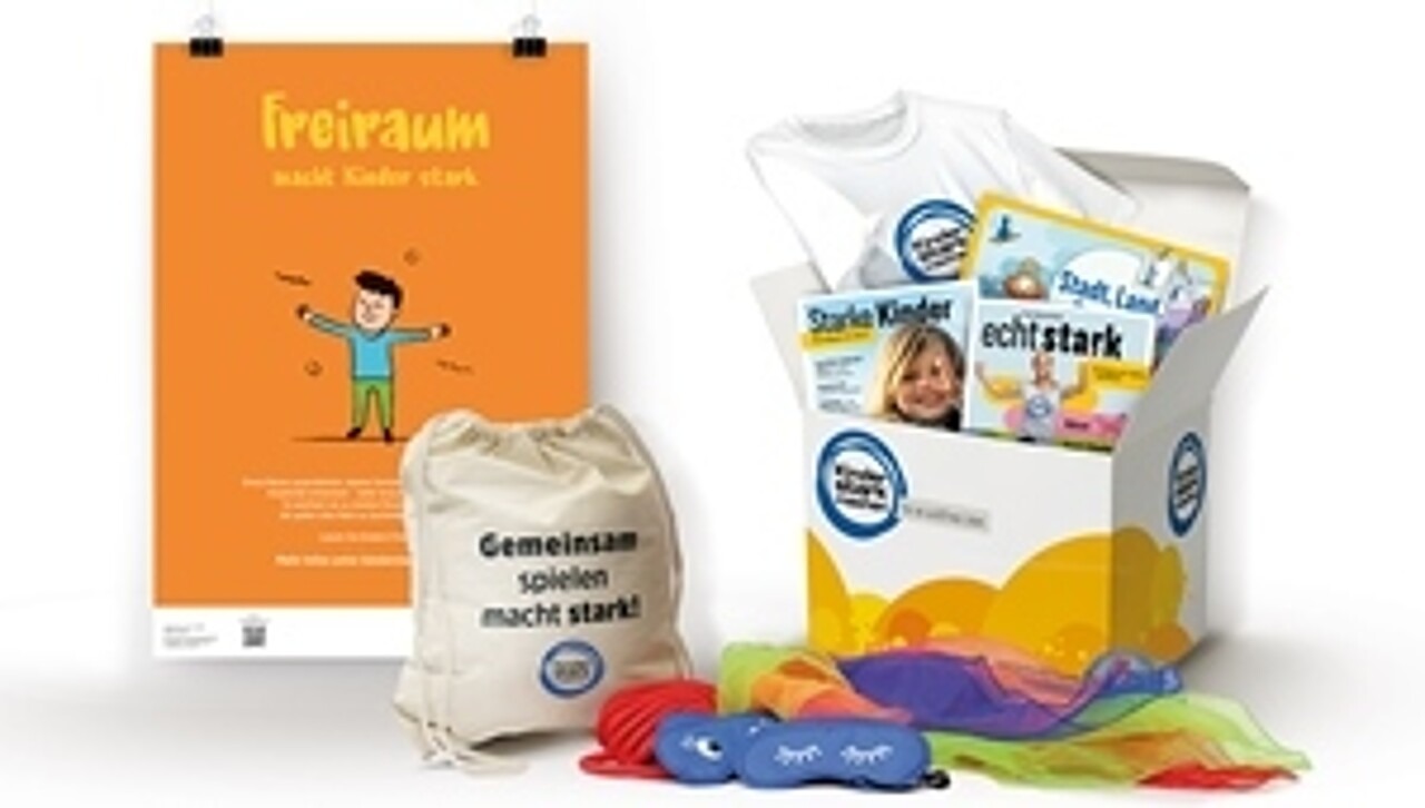 „Kinder stark machen“-Box mit Inhalt: Spieleset, Mitmachheft, Elternmagazin „Starke Kinder“ etc.