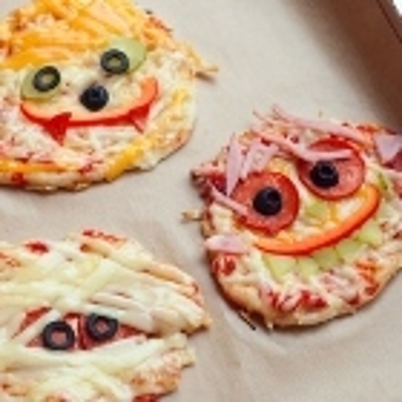 Bild von drei Pizzagesichtern