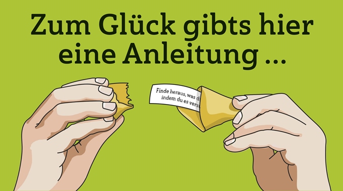 © Ina Kerckhoff Zwei Hände öffnen einen Glückskeks